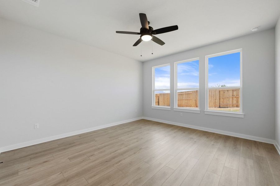 Spacious, unfurnished interior of a new home in Terrace Collection At Turner's Crossing, Buda (Image 33).