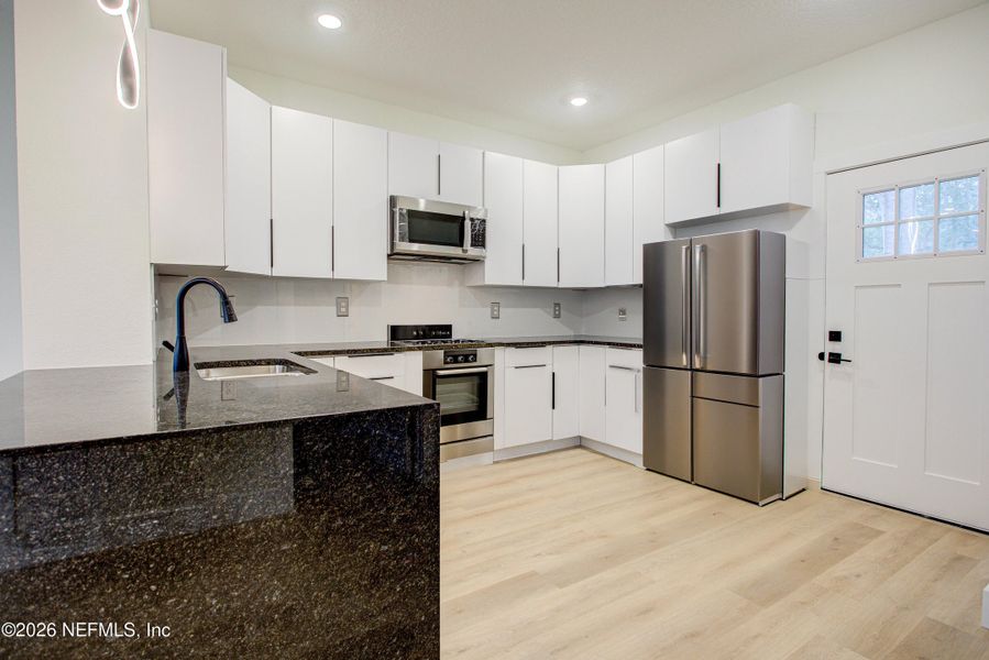 Furnished interior view inside a new home in , Jacksonville (Image 3). Furnished interior view inside a new home in , Jacksonville (Image 3).