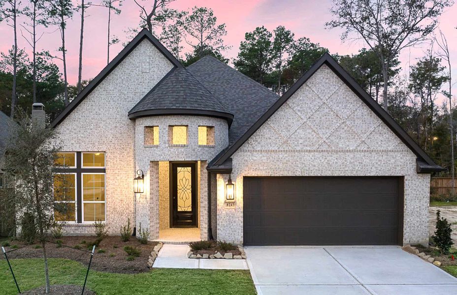 Representative exterior photo of a completed home built from the 2899 by Ravenna Homes in The Highlands 55′, Porter, TX (Image 1). Representative exterior photo of a completed home built from the 2899 by Ravenna Homes in The Highlands 55′, Porter, TX (Image 1).
