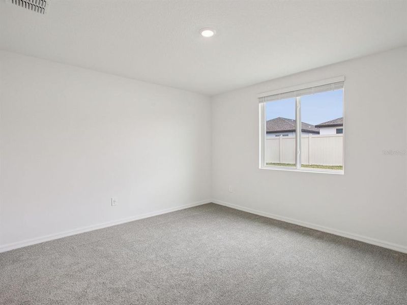 Spacious, unfurnished interior of a new home in Magnolia Bay - Premier Series, Nokomis (Image 12).