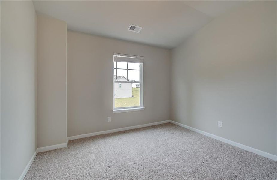 Spacious, unfurnished interior of a new home in Berkeley Lakes, Locust Grove (Image 24).