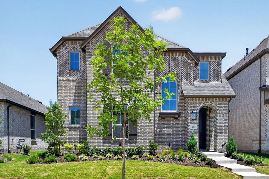 Front exterior of a new home in Mantua Point, Van Alstyne, TX, highlighting curb appeal (Image 1). Front exterior of a new home in Mantua Point, Van Alstyne, TX, highlighting curb appeal (Image 1).