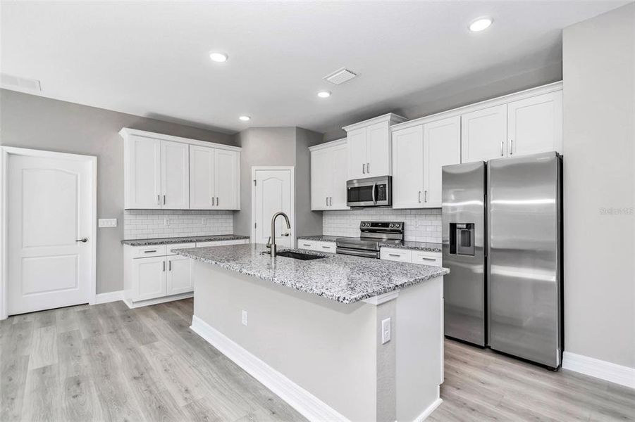 Furnished interior view inside a new home in , Summerfield (Image 16).