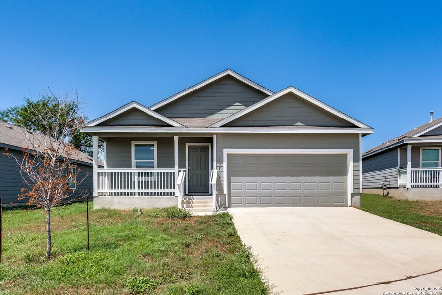 Front exterior of a new home in , San Antonio, TX, highlighting curb appeal (Image 15).