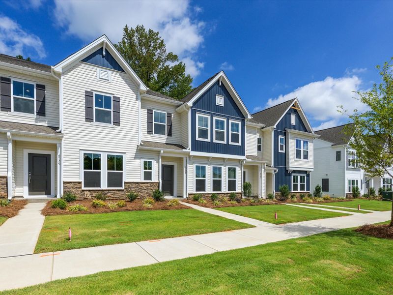 Front exterior of a new home in Westwood Reserve, Charlotte, NC, highlighting curb appeal (Image 2). Front exterior of a new home in Westwood Reserve, Charlotte, NC, highlighting curb appeal (Image 2).