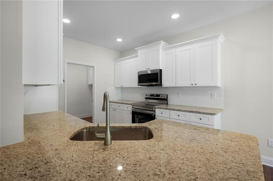 Furnished interior view inside a new home in , Calhoun (Image 13).