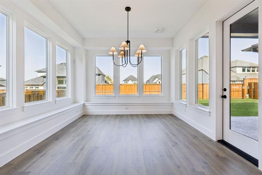 Light filled and spacious, your new dining room is the perfect place to host grand dinner parties or cozy family meals!