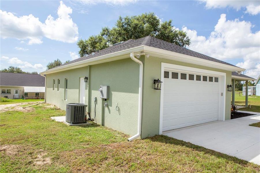 Front exterior of a new home in , Citrus Springs, FL, highlighting curb appeal (Image 23).