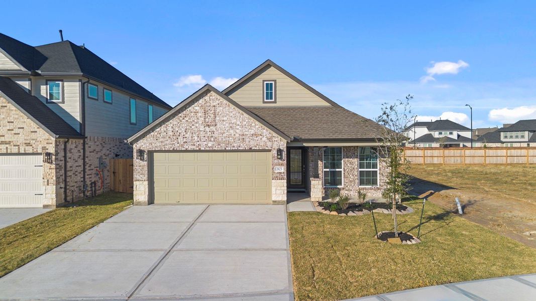 Front exterior of a new home in Morton Creek Ranch, Katy, TX, highlighting curb appeal (Image 15).