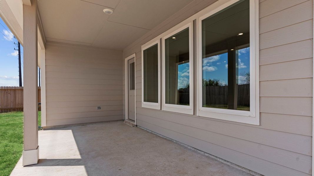 Exterior details and patio area of a home in Tamarron, Fulshear (Image 3). Exterior details and patio area of a home in Tamarron, Fulshear (Image 3).