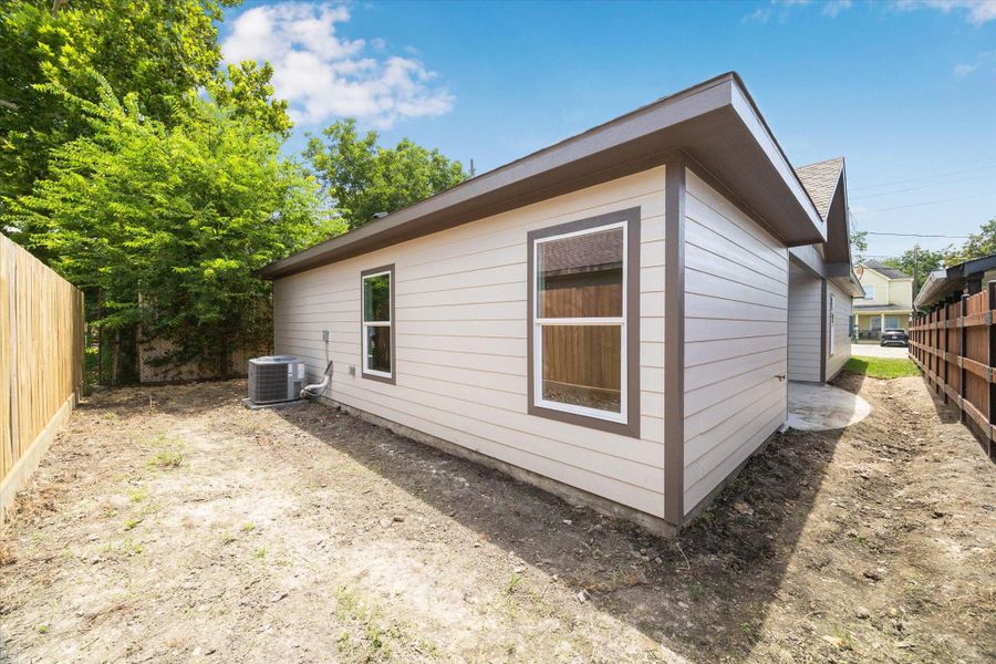 Exterior details and patio area of a home in , Houston (Image 18). Exterior details and patio area of a home in , Houston (Image 18).