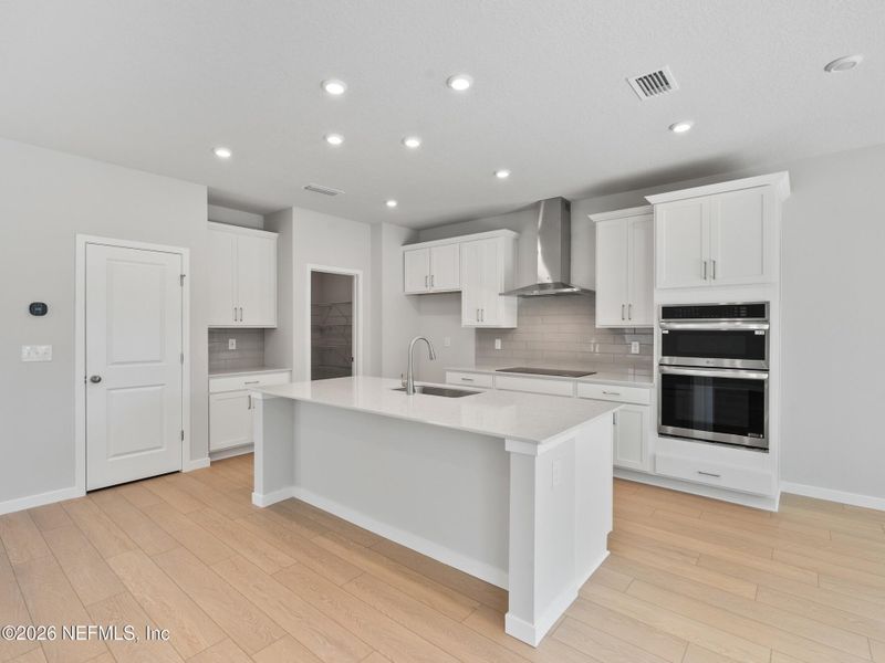 Furnished interior view inside a new home in Seminole Palms, Palm Coast (Image 10).