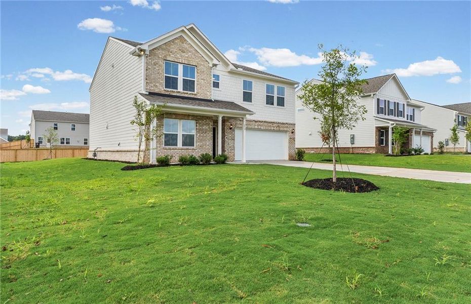 Front exterior of a new home in Anderson Point, McDonough, GA, highlighting curb appeal (Image 21).