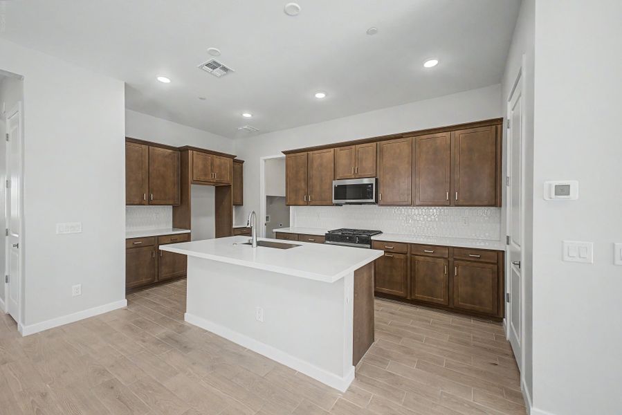 Furnished interior view inside a new home in Mira Vista at Victory, Buckeye (Image 5).