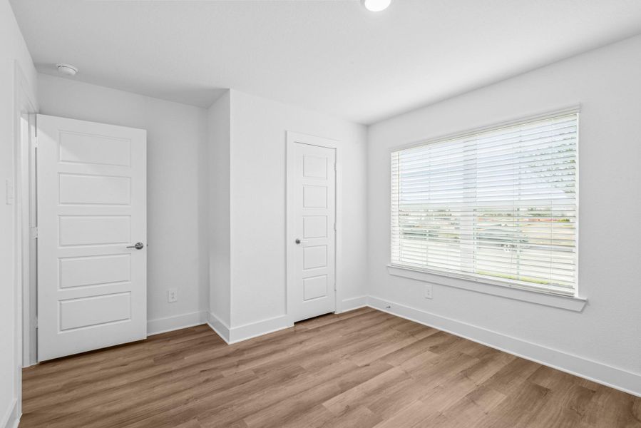 Spacious, unfurnished interior of a new home in Sorella, Tomball (Image 34).