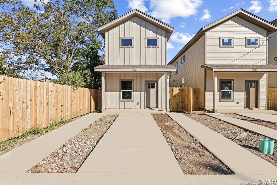 Front exterior of a new home in , San Antonio, TX, highlighting curb appeal (Image 1).