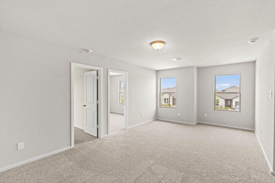 Spacious, unfurnished interior of a new home in Windrose Green, Angleton (Image 23).