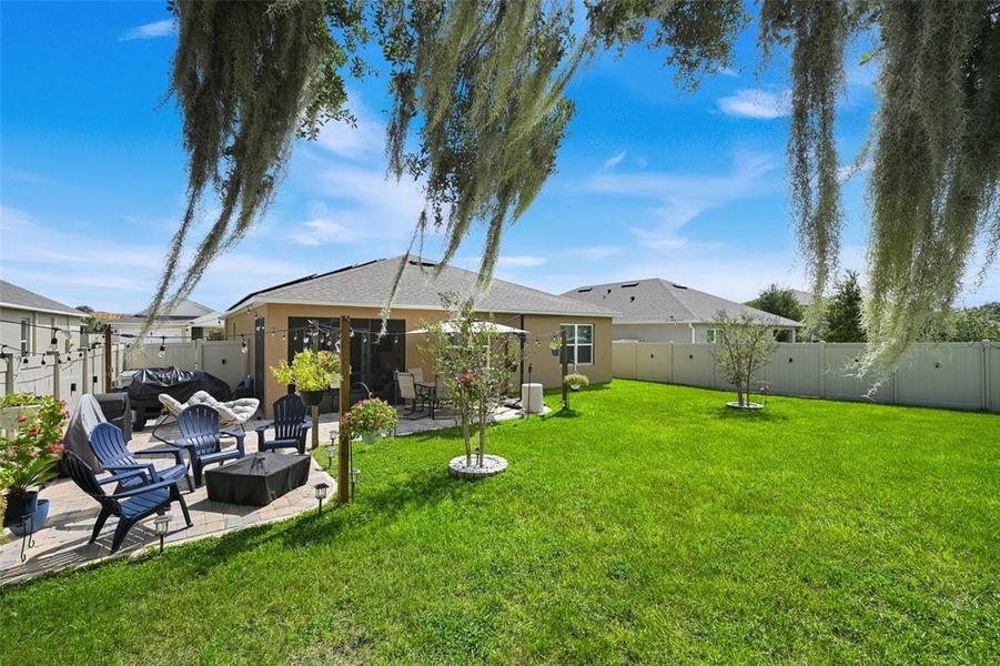 Exterior details and patio area of a home in Windrose, Apopka (Image 22).