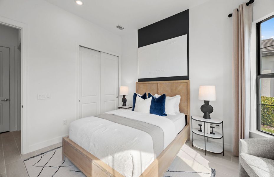 Representative furnished interior of a home built from the Prosperity by DiVosta in BeachWalk by Manasota Key, Englewood (Image 18).