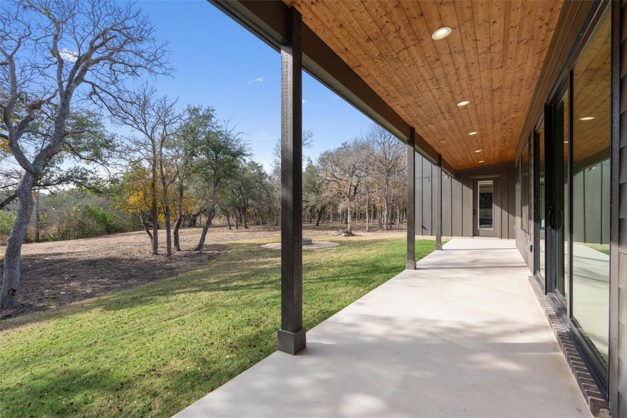 Covered back patio designed for everyday enjoyment, with private access from the primary suite and large sliding doors that connect the main living spaces to the outdoors. Covered back patio designed for everyday enjoyment, with private access from the primary suite and large sliding doors that connect the main living spaces to the outdoors.