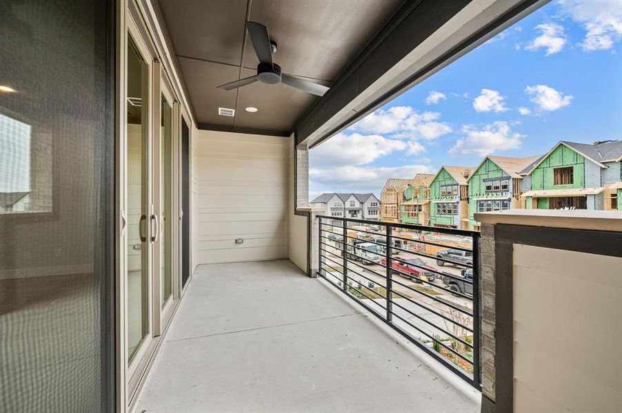 It's easy to take the party outside on this wonderful covered balcony.