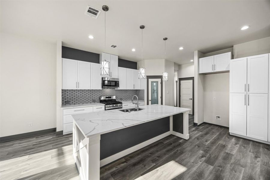 Furnished interior view inside a new home in , Conroe (Image 3).