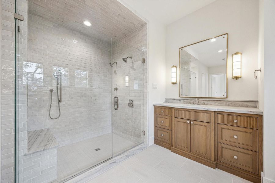Wonderful oversized Primary Shower with multiple shower features and antique custom tile work! Wonderful oversized Primary Shower with multiple shower features and antique custom tile work!