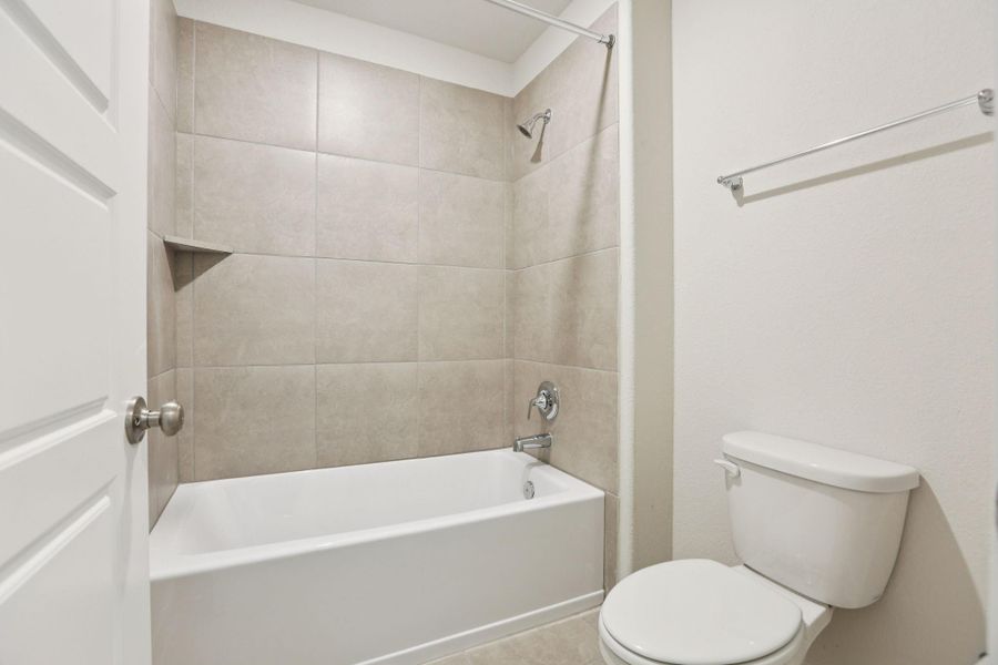 Photos are not of the actual home, but are photos of the builder home with same floorplan with similar interior finishes.