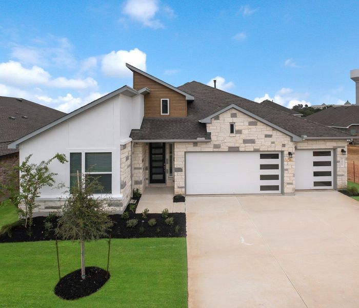 Representative exterior photo of a completed home built from the Englewood by Scott Felder Homes in Prominence, San Antonio, TX (Image 16).