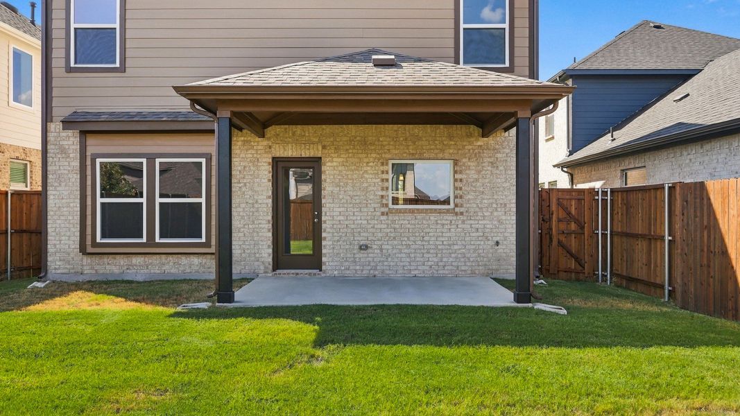 Exterior details and patio area of a home in Westridge Journey, McKinney (Image 24).