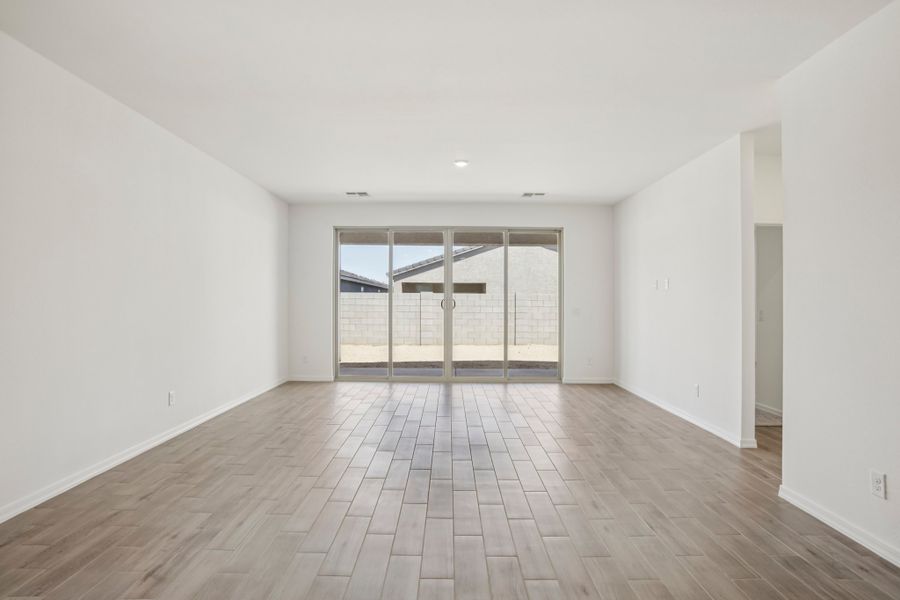 Great room. Finishes and options may vary by community