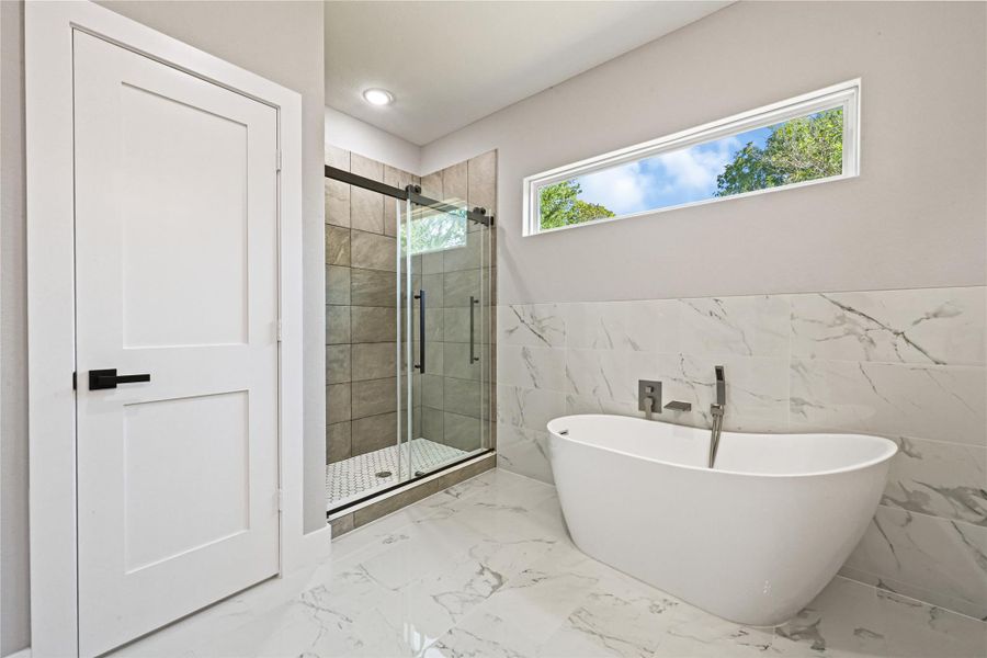 Master bathroom with soaking tub and shower