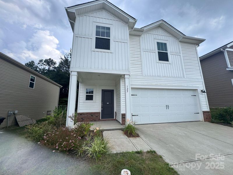 Front exterior of a new home in Shepherds Landing, Mooresville, NC, highlighting curb appeal (Image 16). Front exterior of a new home in Shepherds Landing, Mooresville, NC, highlighting curb appeal (Image 16).