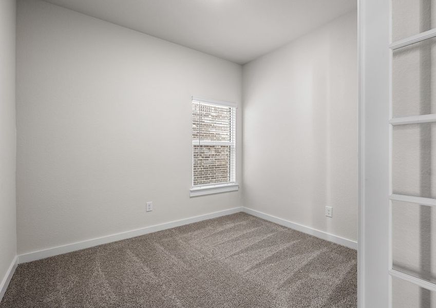 The versatile flex room sits right off of the living room.