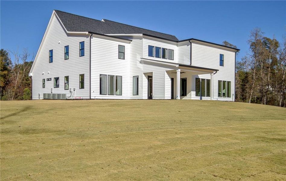 Exterior details and patio area of a home in , Brooks (Image 3).