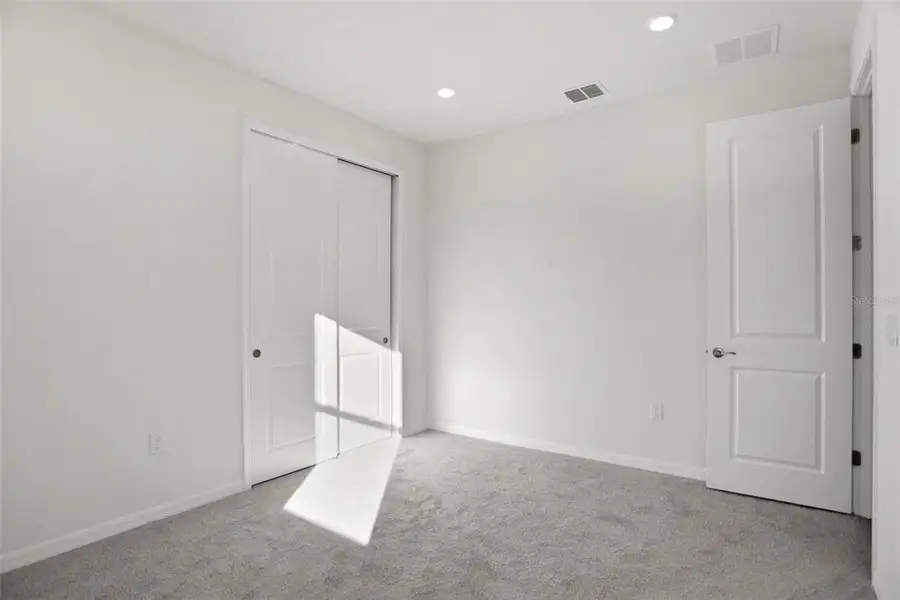 Spacious, unfurnished interior of a new home in Turnleaf, Punta Gorda (Image 13). Spacious, unfurnished interior of a new home in Turnleaf, Punta Gorda (Image 13).