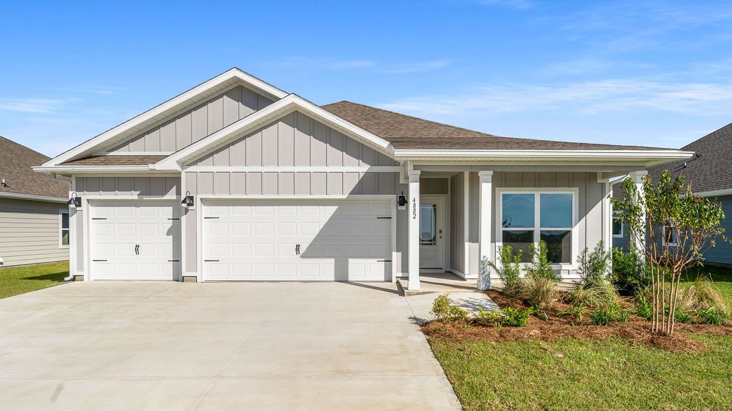 Front exterior of a new home in Titus Park, Panama City, FL, highlighting curb appeal (Image 1). Front exterior of a new home in Titus Park, Panama City, FL, highlighting curb appeal (Image 1).
