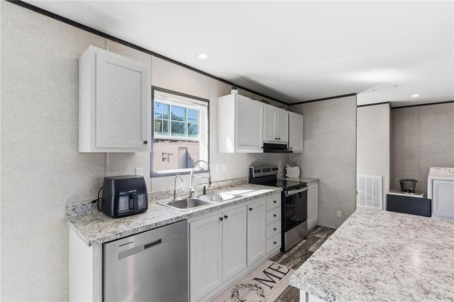 Furnished interior view inside a new home in , Fort Meade (Image 22).
