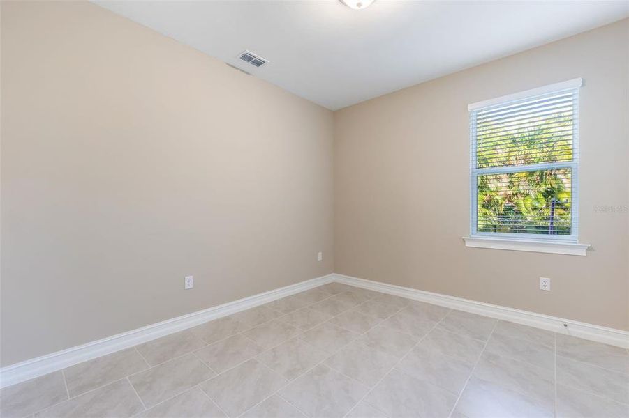 Spacious, unfurnished interior of a new home in Deep Creek Tradition Series, Punta Gorda (Image 18).