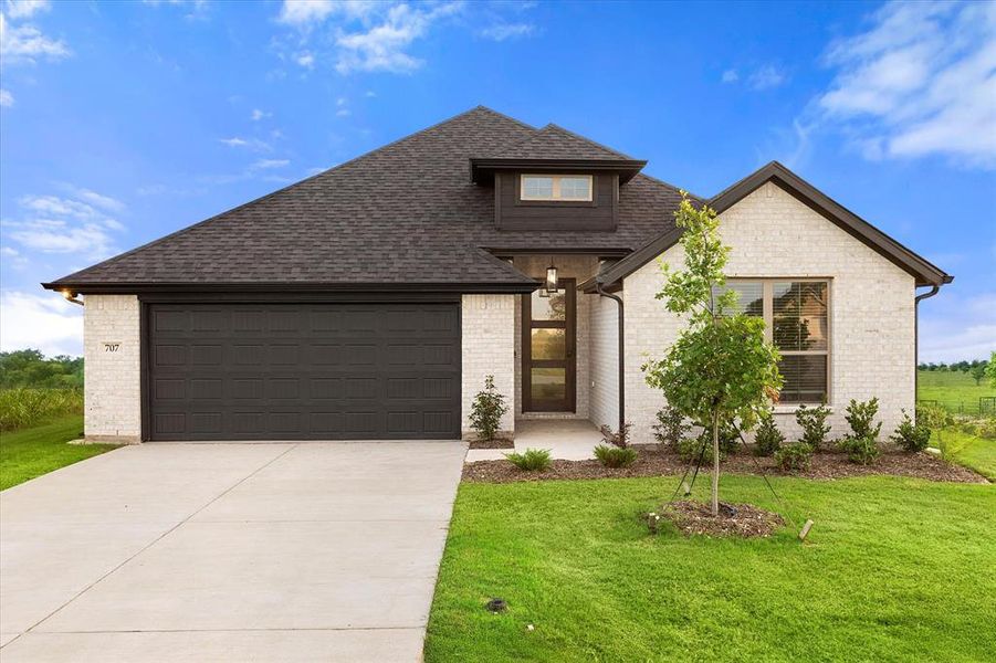 Front exterior of a new home in , Italy, TX, highlighting curb appeal (Image 23).