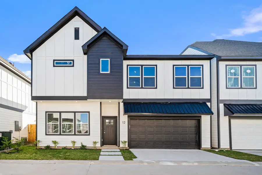 Front exterior of a new home in Metro Village, Houston, TX, highlighting curb appeal (Image 2). Front exterior of a new home in Metro Village, Houston, TX, highlighting curb appeal (Image 2).