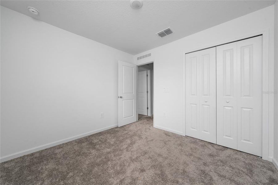 Spacious, unfurnished interior of a new home in Ranches at Lake Mcleod: Legacy Collection, Eagle Lake (Image 9).