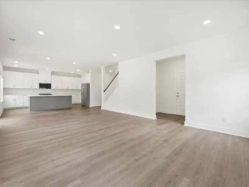 Spacious, unfurnished interior of a new home in The Coves at Lakes of Cane Bay, Summerville (Image 21). Spacious, unfurnished interior of a new home in The Coves at Lakes of Cane Bay, Summerville (Image 21).