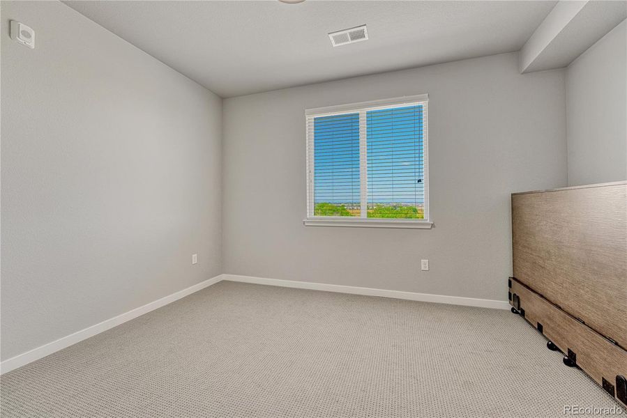 Spacious, unfurnished interior of a new home in The Trails at Westcreek, Parker (Image 18).