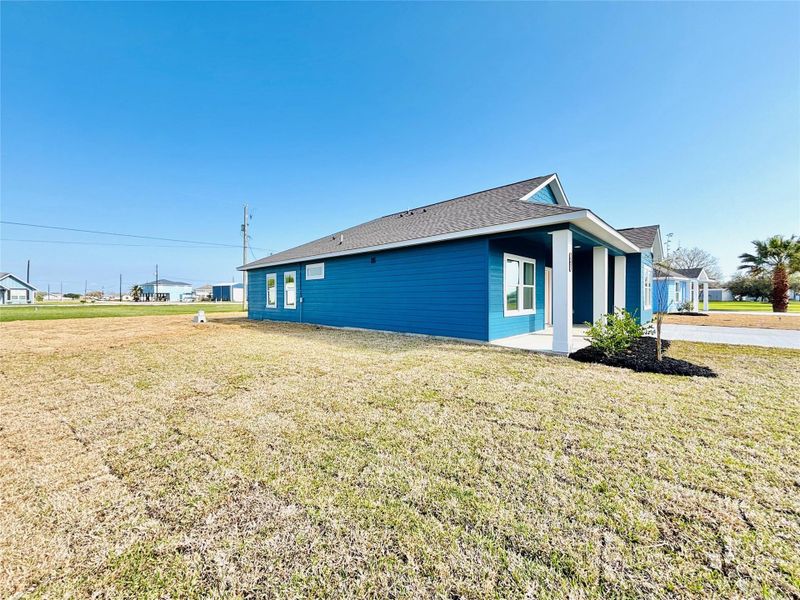 Front exterior of a new home in , Palacios, TX, highlighting curb appeal (Image 2). Front exterior of a new home in , Palacios, TX, highlighting curb appeal (Image 2).
