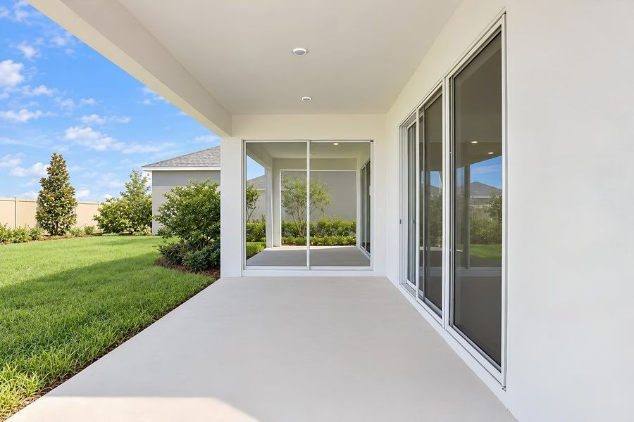 Exterior details and patio area of a home in Lochside, Mount Dora (Image 24).