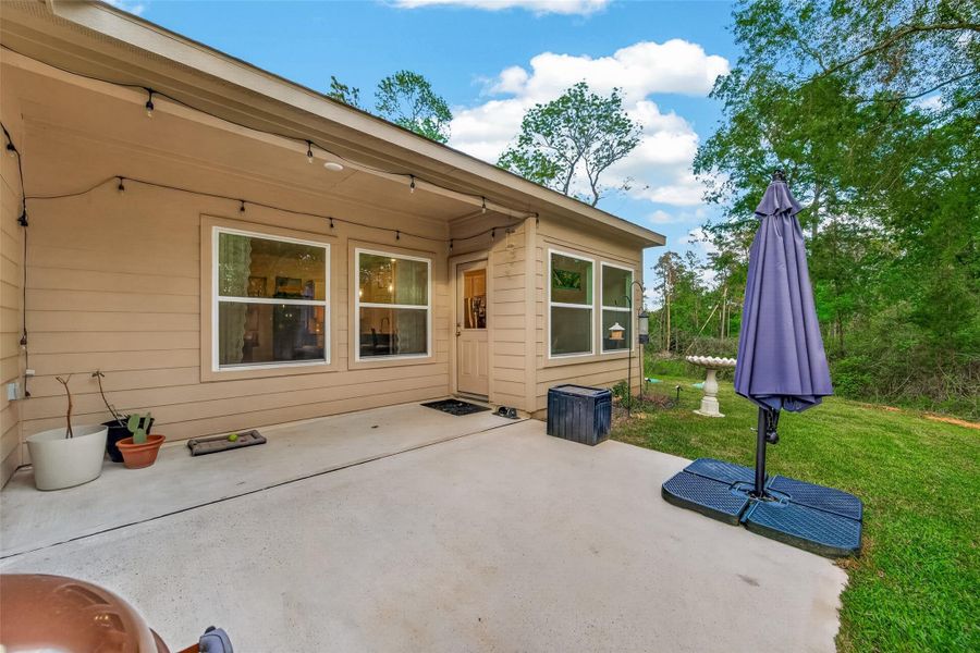 Exterior details and patio area of a home in , Willis (Image 24).
