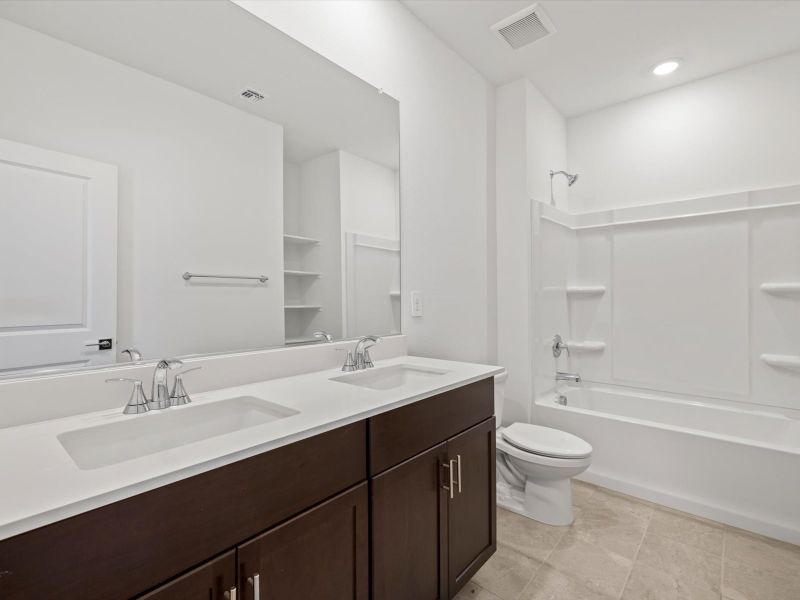 Furnished interior view inside a new home in Rancho Mirage Estate Series, Maricopa (Image 5).