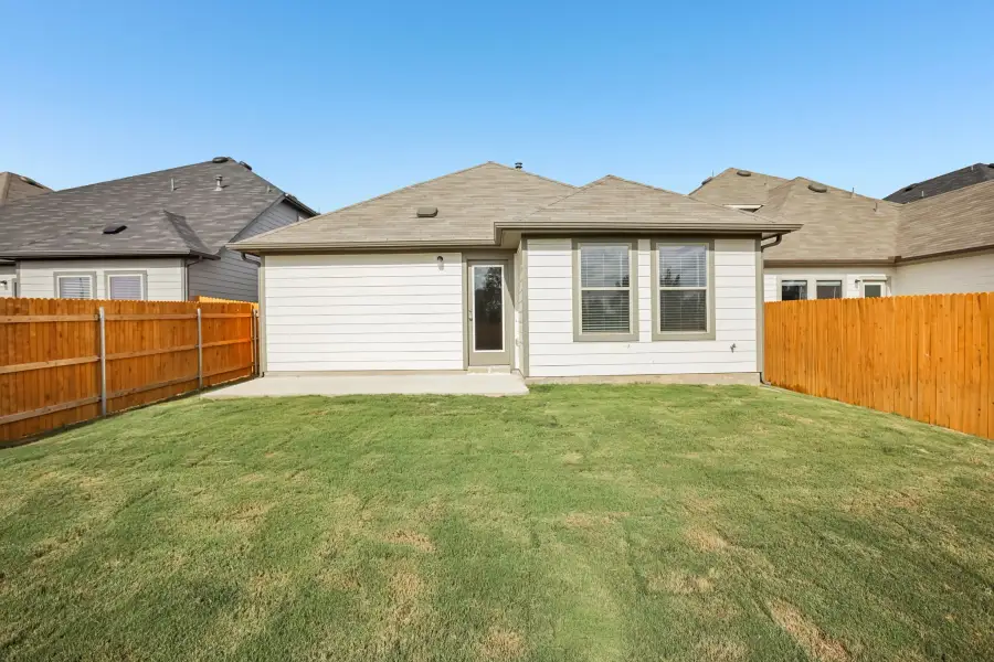 Exterior details and patio area of a home in Trinity Ranch, Elgin (Image 24).