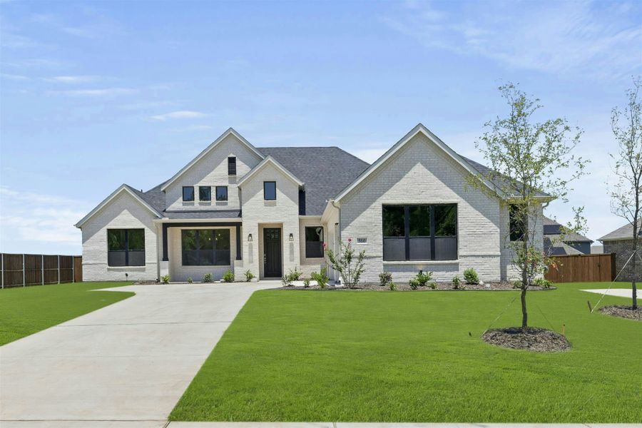Front exterior of a new home in Kentsdale Farms, DeSoto, TX, highlighting curb appeal (Image 2). Front exterior of a new home in Kentsdale Farms, DeSoto, TX, highlighting curb appeal (Image 2).